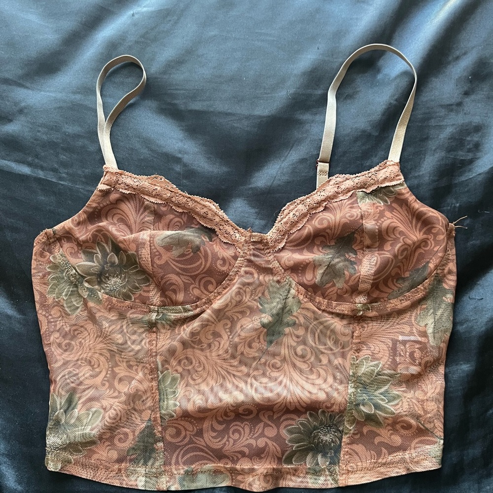 Laced netting cropped tank.